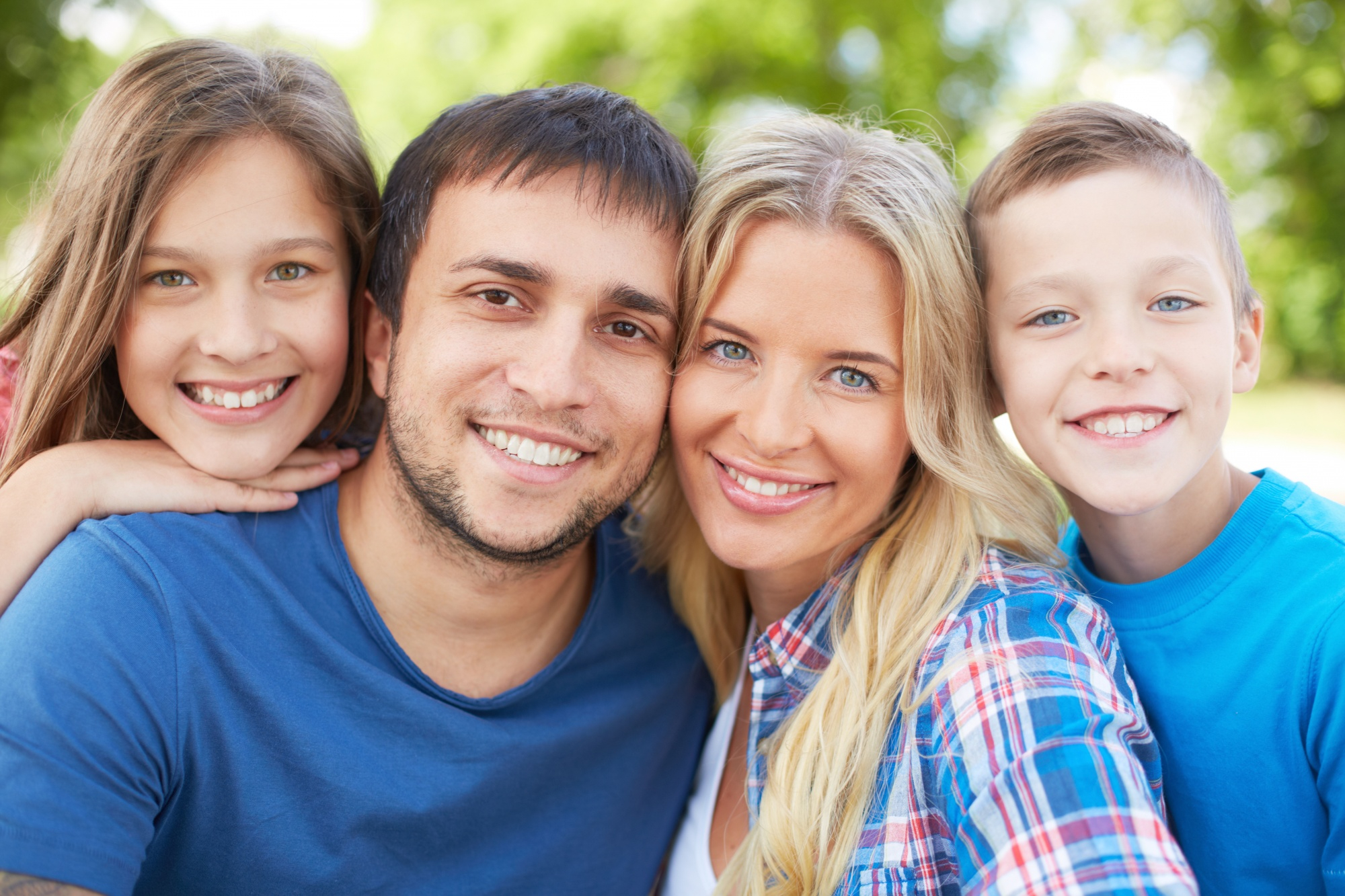 A family photo. All are smiling.